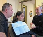Children_dentist_Dr_Mark_Bancroft_explaining_a_procedure_to_one_of_his_patients.jpg