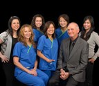 Dr_Reeves_and_his_team_of_dental_hygienists.jpg