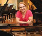Sara_open_piano.jpg