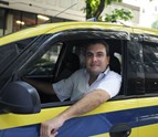 bigstockPortraitOfATaxiDriverWit.jpg
